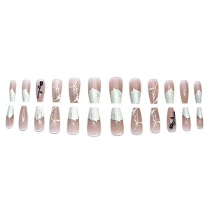 Long coffin press-on nails with white French tips, black rose relief, and silver glitter