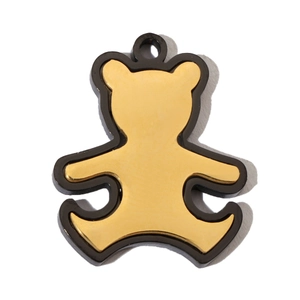 Detail of bear pendant with gold and black color-blocking in stainless steel material