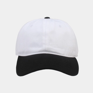 Detail of high-density cotton baseball cap with contrast black brim and white crown