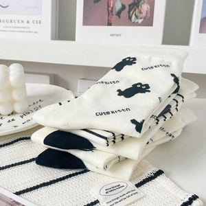 Cute white cotton mid-calf socks with black kitten patterns and text for women