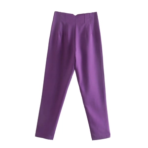 Flat lay of purple high-waisted slim trousers with professional front pleat design