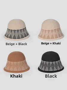 Detail view of four vintage knitted bucket hats with diamond pattern and stripe textures