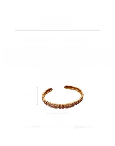 Detail view of 18k gold plated enamel flower bracelet with rhinestones and dimensions