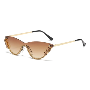 Luxury rhinestone cat-eye sunglasses with brown gradient lenses and gold frames