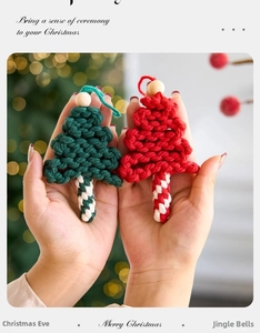 Handmade crochet Christmas tree ornament with wooden bead detail and festive red green cotton