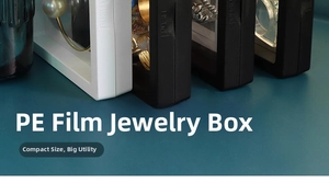 Detail shot of black and white 3D floating display cases with clear PE film for jewelry