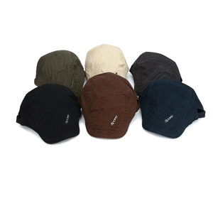 Set of six colorful vintage flat caps featuring sports metal logo and decorative stitching