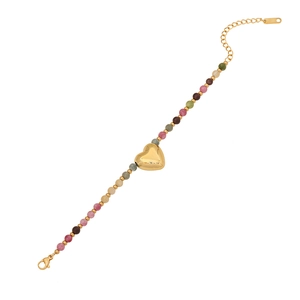 Vintage natural stone beaded bracelet with gold heart charm and colorful beads on white