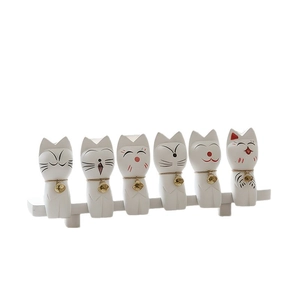 Set of six minimalist white cat figurines with gold bells for elegant home desktop decor