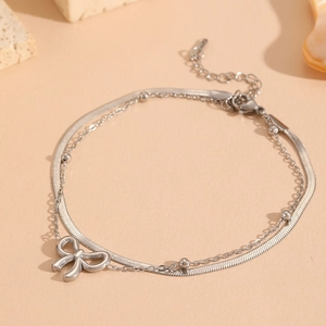 Bracelet de cheville double couche argenté avec chaîne serpent, perles et pendentif nœud