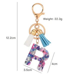 Colorful resin letter R keychain with dual tassels and gold ring, 12.2cm total length