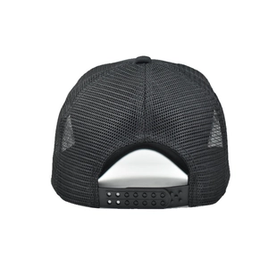 Detail of black mesh trucker hat showing breathable mesh back and adjustable snapback closure
