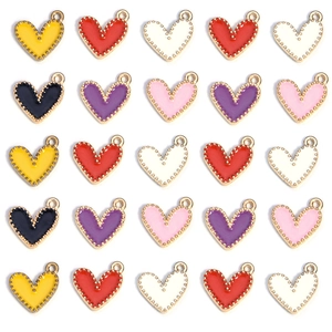 Macro shot of colorful enamel heart pendants in multiple shades arranged in a 5x5 grid