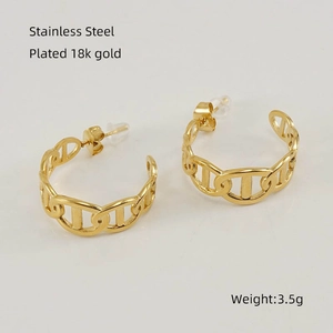 Close-up of gold chain link hoop earrings made of 18k gold plated stainless steel