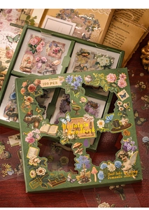 Detail of 100pcs vintage scrapbook sticker set in ornate dark green decorative box