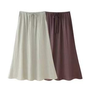 Detailed view of elastic drawstring waist on high-waisted pleated A-line skirt
