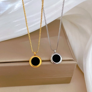 Titanium steel necklaces with round black pendants in gold and silver finishes