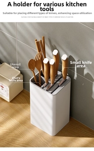 Detailed section layout for knives, cutlery and utensils in a white kitchen organizer