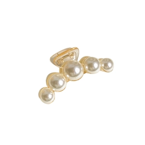 Elegant pearl claw clip with gold alloy base and creamy white pearls for women hair styling