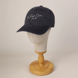 Classic washed cotton baseball cap with The Pacific Ocean embroidery on a mannequin head