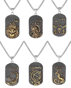 Detailed view of six vintage zodiac rectangular pendants in gold and titanium steel