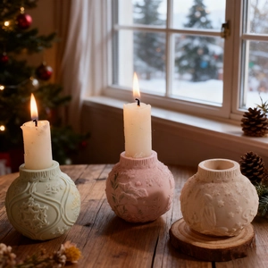 Three Christmas lantern ball candle holders with snowflake relief in pastel macaron colors