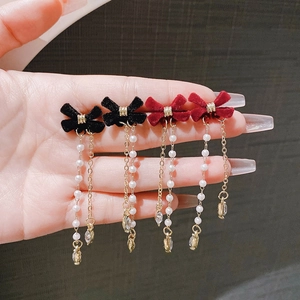 Long red and black velvet bow earrings with pearl tassels and teardrop pendants