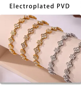Detail of PVD electroplated floral bracelets with sparkling zircons in gold and silver