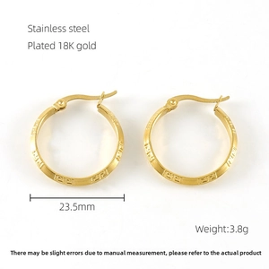 Detail of 23.5mm 18K gold plated stainless steel hoop earrings with Greek key pattern
