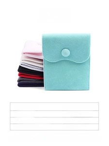 Detailed display of colorful velvet jewelry snap pouches in various soft fabric options