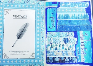 Detail of vintage blue winter washi tape with snowflakes and elk for scrapbooking DIY
