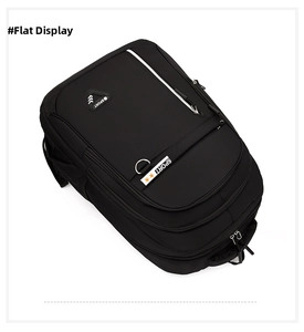 Vista superior detallada de una mochila negra de negocios con cremalleras blancas