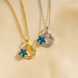 Titanium steel sun moon necklaces in gold and silver with blue star charms on beige silk