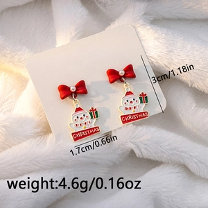 Detail view of snowman earrings with red bow and size dimensions 3cm by 1.7cm
