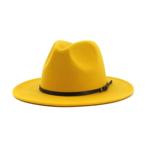 Detail of yellow wool felt fedora featuring a black leather band and metal buckle