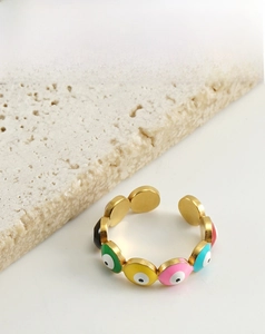 Detail of colorful enamel evil eye open ring crafted in 18K gold plated stainless steel