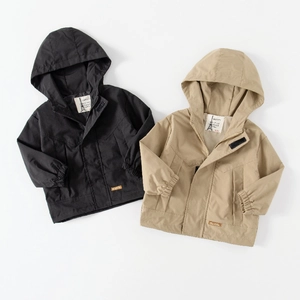Flat lay of kids hooded windbreaker jackets in black and khaki with ribbed cuffs