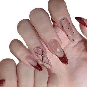 French wine red cat-eye almond press-on nails with lattice and polka dot design