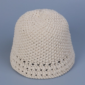 Handmade beige crochet bucket hat with hollow flower pattern and narrow brim for women