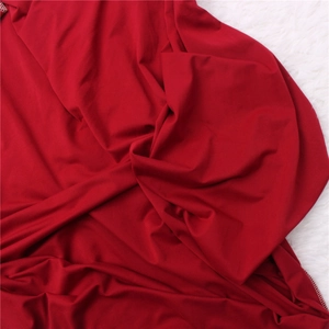 Macro detail of soft red knitted fabric texture for newborn baby swaddle blanket sets