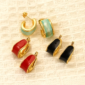Three pairs of vintage enamel hoop earrings in green, red, and black with gold plating