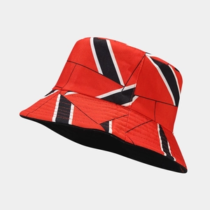Detail of red Union Jack fisherman hat featuring vibrant stripes and fine canvas texture