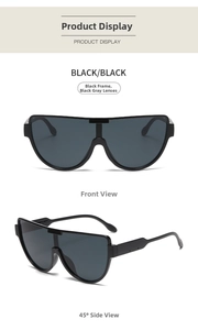 Front and 45-degree side view of oversized black semi-rimless sporty sunglasses