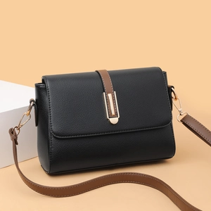 Chic black litchi pattern flap crossbody bag with gold buckle and brown strap