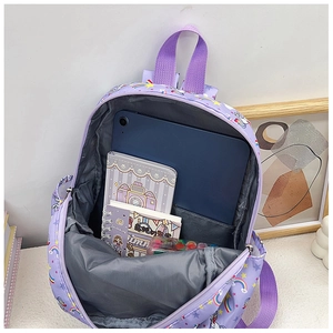 Internal view of purple unicorn kid backpack with dedicated tablet sleeve and pockets