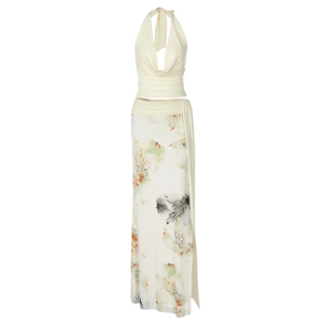 Detail of floral print maxi skirt and halter neck top with mesh patchwork textures