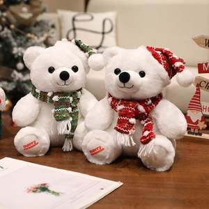 White Christmas teddy bears with festive scarves and Merry Christmas embroidery