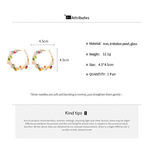 Detailed product specifications for crystal and pearl beaded hoop earrings with silver pins