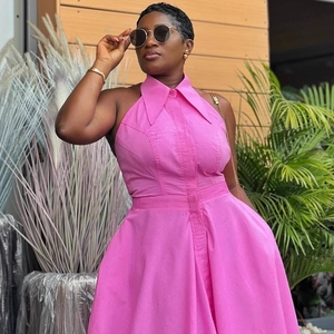 Pink halter neck maxi dress with large lapel collar and waist-defining buttons