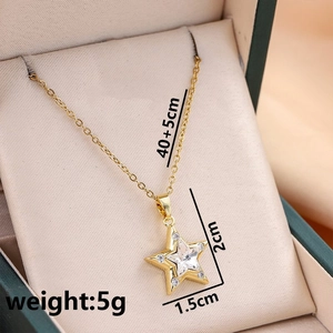 Detail of gold star pendant with crystals and 40+5cm titanium steel chain